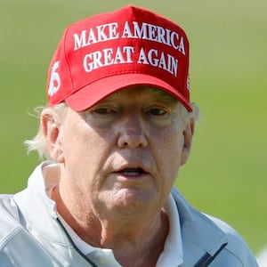 Donald Trump at one of his favorite places, a golf course.