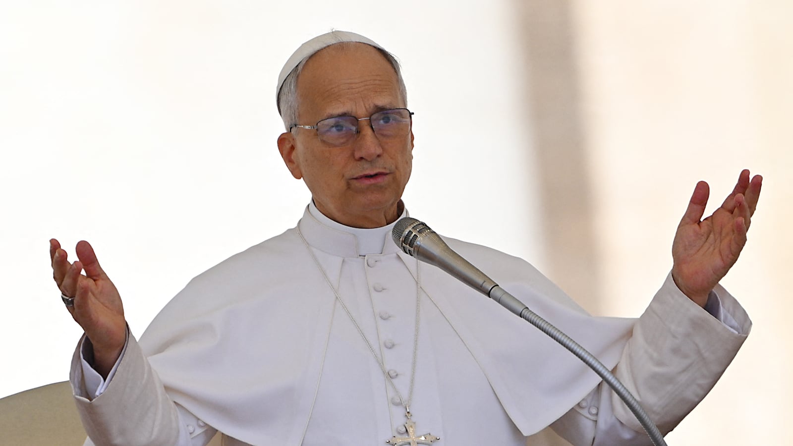 Pope Leo XIV blesses to the crowd during the weekly general audience at St Peter's Square at the Vatican on May 28, 2025.