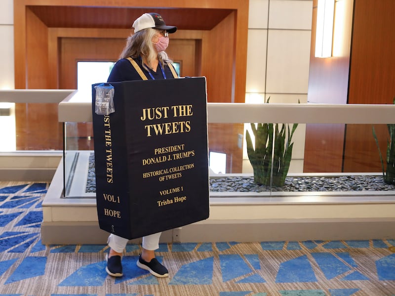 Trisha Hope supports Donald Trump at CPAC in Orlando, Florida, on Feb. 26, 2021.