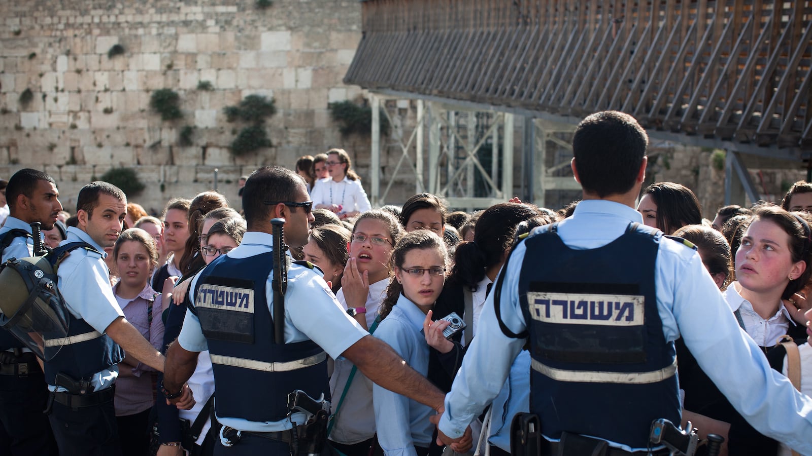 articles/2013/11/06/talking-to-women-of-the-wall-s-ultra-orthodox-teenage-protesters/womenofthewall-ortho-openz_jkkrir
