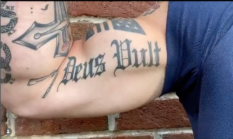 Hegseth's tattoo reads "deus vult," Latin for "God wills it." Pete Hegseth/Instagram.