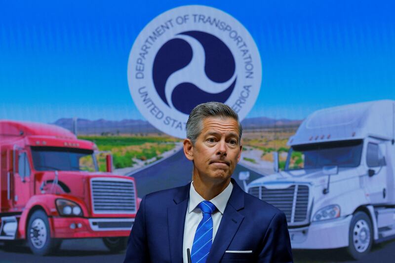 U.S. Transportation Secretary Sean Duffy reacts as he announces actions against states for failing to enforce English language requirements for commercial drivers, during a press conference at the U.S. Department of Transportation in Washington, D.C., U.S., August 26, 2025. REUTERS/Brian Snyder