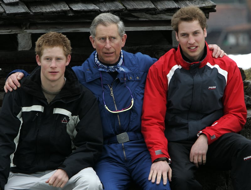 King Charles (C) and his sons, Prince William (R) and Prince Harry (L), pose for photographs in Klosters, March 31, 2005.