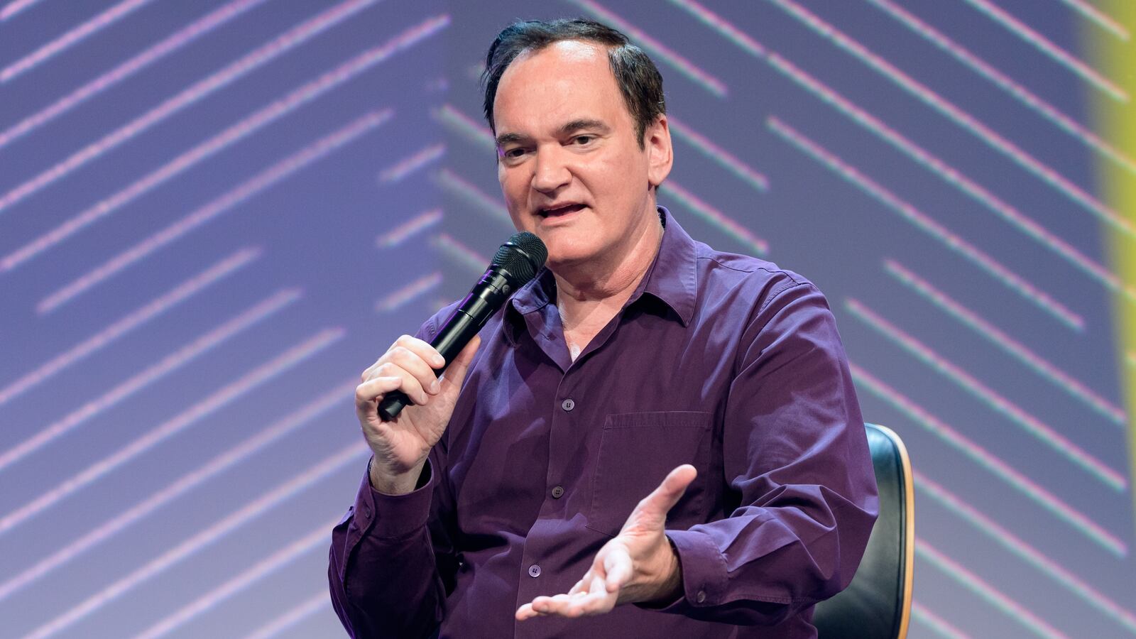 18 May 2022, Hamburg: Director Quentin Tarantino gestures during his appearance. The OMR digital festival in Hamburg focuses on a combination of trade fair, workshops and party. Photo: Jonas Walzberg/dpa (Photo by Jonas Walzberg/picture alliance via Getty Images)