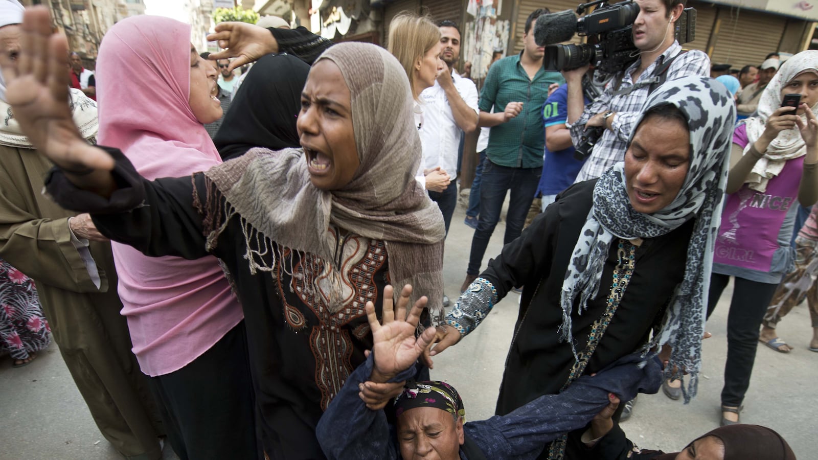 articles/2014/04/28/the-hanging-judge-of-minya-egypt-sentences-hundreds-to-death/140428-minya-trew-tease_xrpmmp