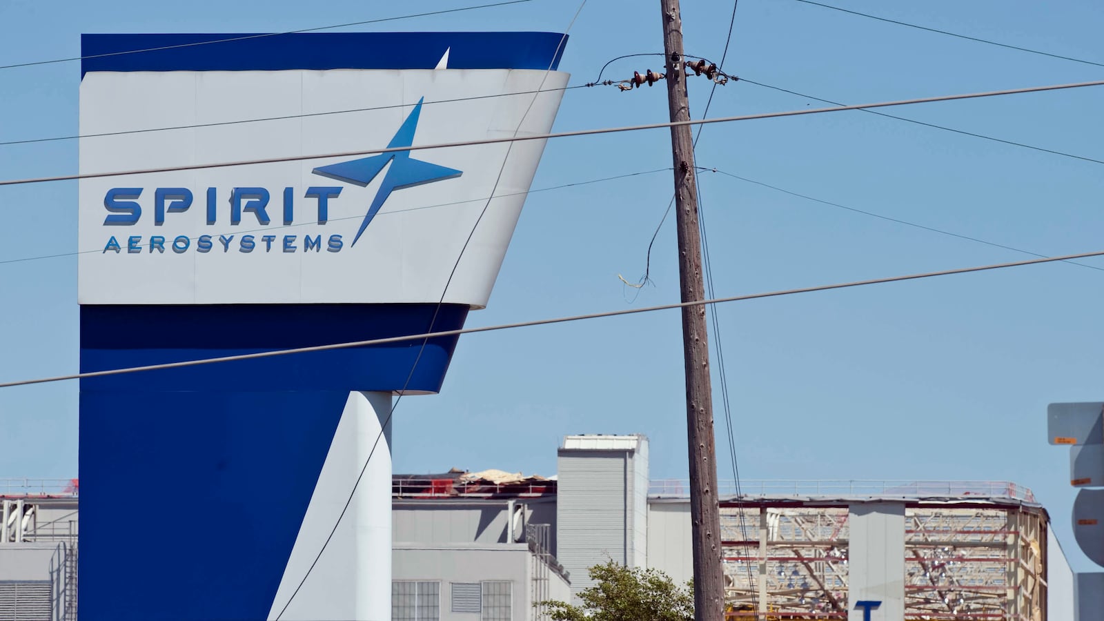 The damaged Spirit AeroSystems sign is seen damaged after an EF3 tornado touched ground on April 15, 2012 in Wichita, Kansas