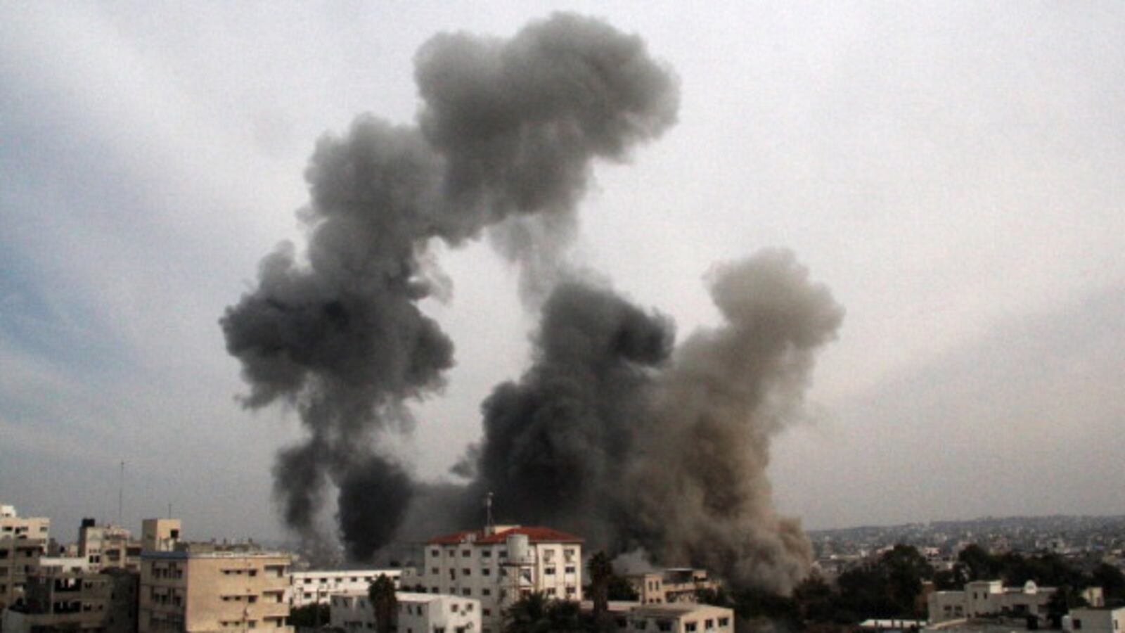 articles/2012/11/21/lessons-for-both-sides/gaza-smoke-openz_k8bdgj