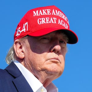 U.S. President Donald Trump looks on before boarding Air Force One en route to Joint Base Andrews at Morristown Municipal Airport in Morristown, New Jersey, U.S., September 7, 2026.