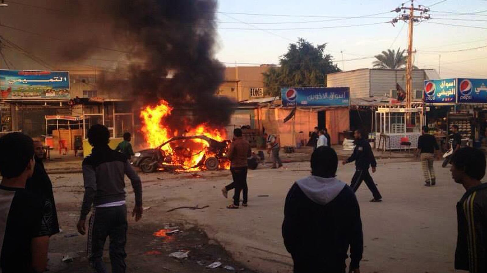 articles/2013/12/13/al-qaeda-s-black-flag-flies-over-iraq/131213-iraq-violence-tease_cvilkc