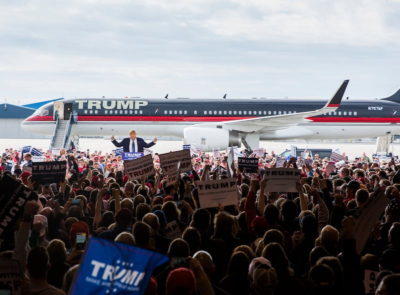 Republican Presidential candidate Donald Trump speaks at a campaign rally in front of his personal airplane, March 12, 2016 in Vandalia, Ohio.