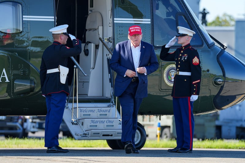 Trump did not salute the Marines while disembarking Marine One on Labor Day. He adjusted his suit jacket instead.