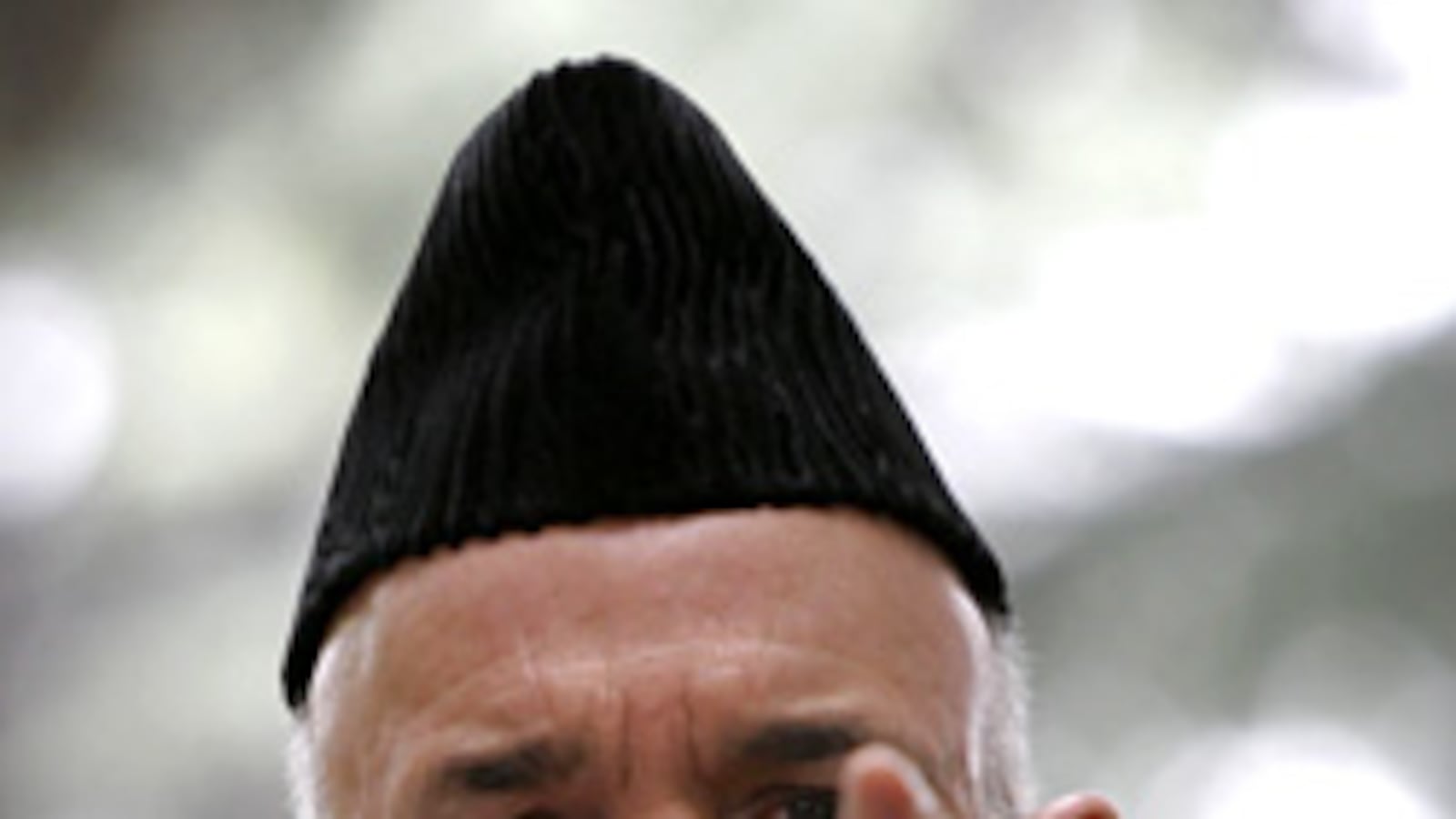 articles/2009/12/17/whos-watching-karzai/farkas-afghanistan-hamid-karzai_69884_dznkjy