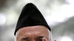 articles/2009/12/17/whos-watching-karzai/farkas-afghanistan-hamid-karzai_69884_dznkjy