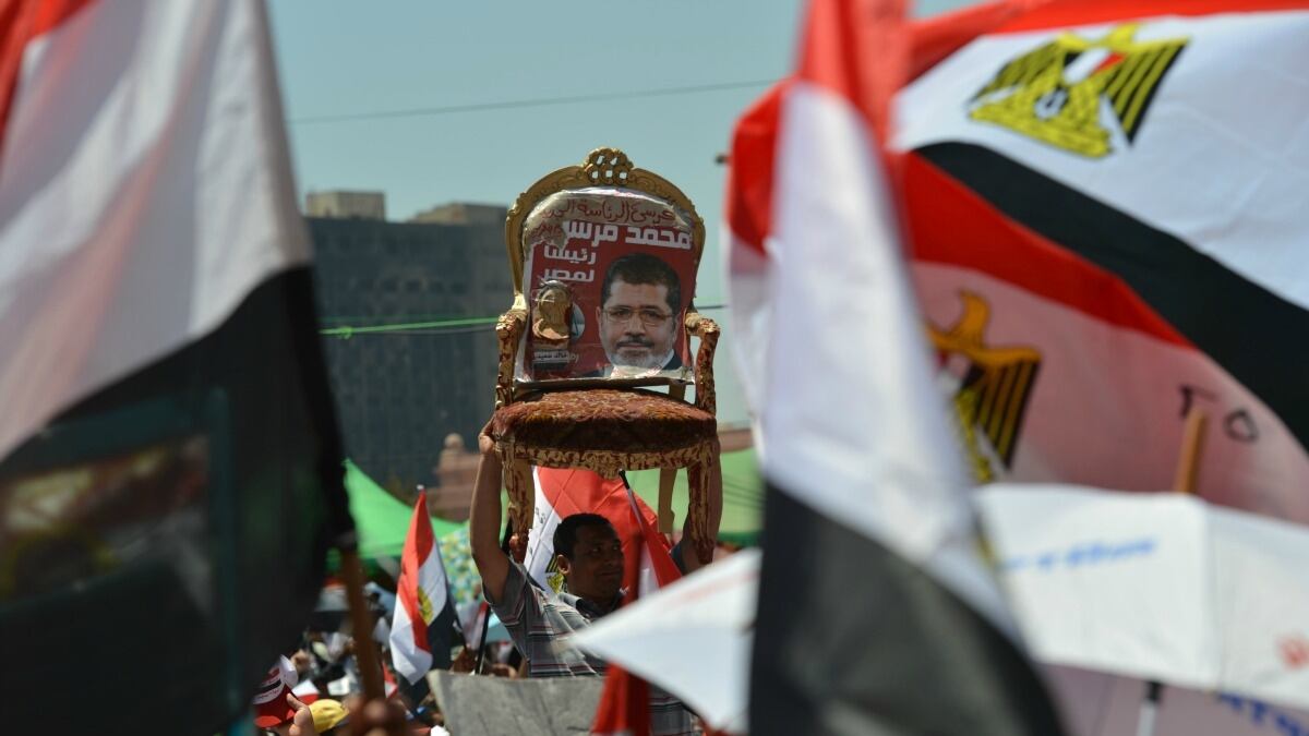 cheats/2012/06/29/morsi-addresses-crowds-in-cairo/mohammed-morsi-chair-cheat_c8fakh