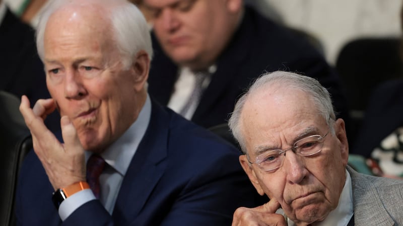 Senate Judiciary Committee Chairman Chuck Grassley (R) and Texas Senator John Cornyn  ponder a committee vote this month.