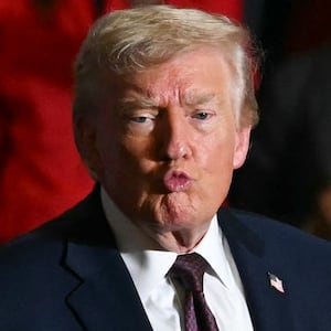 US President Donald Trump gestures to the crowd after speaking at a political rally in Rocky Mount, North Carolina on December 19, 2025.