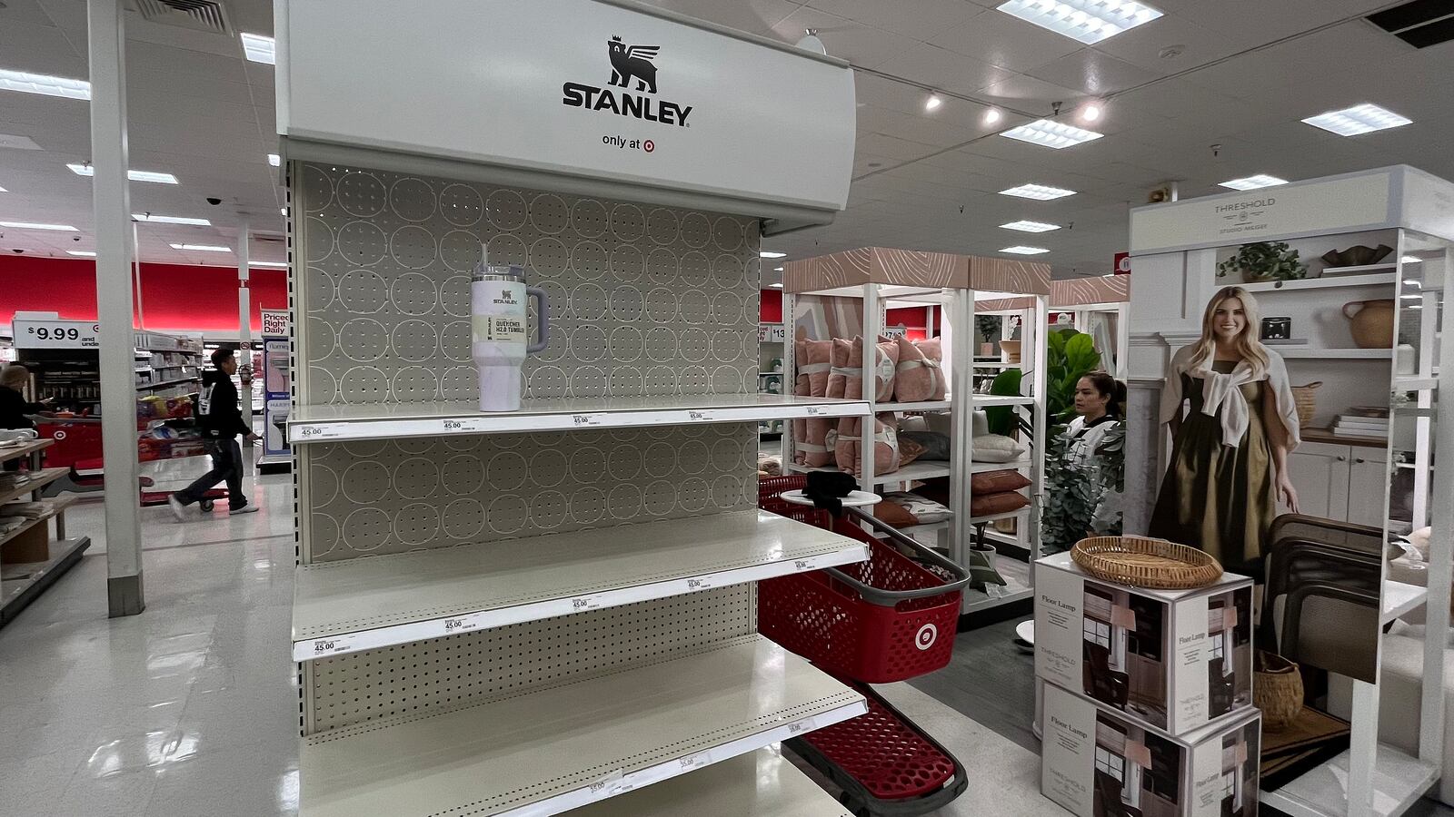 A Los Angeles Target display with only one Stanley Cup left on the shelf.