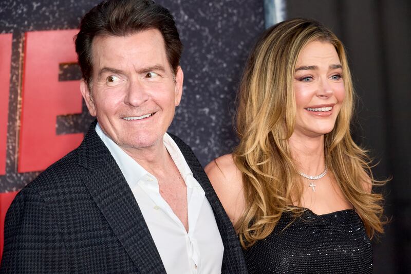 HOLLYWOOD, CALIFORNIA - SEPTEMBER 04: (L-R) Charlie Sheen and Denise Richards attend the Los Angeles Premiere Of Netflix's "aka Charlie Sheen"at TUDUM Theater on September 04, 2025 in Hollywood, California. (Photo by Unique Nicole/Getty Images)