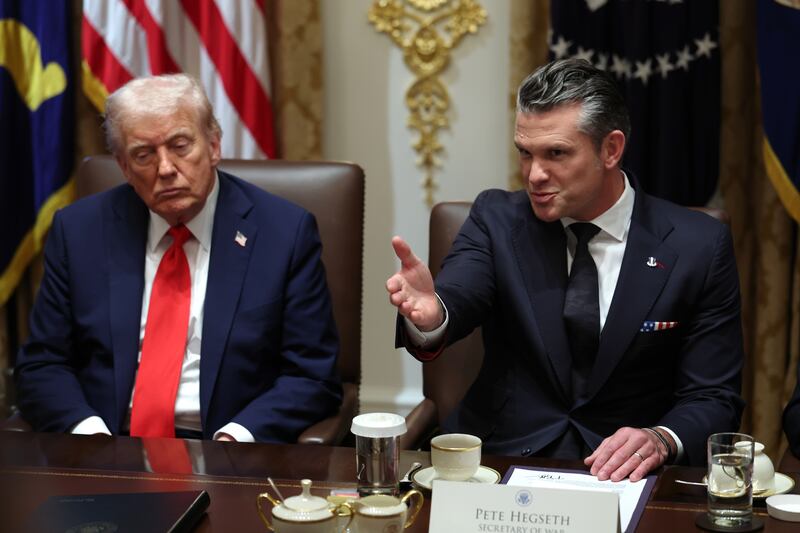 WASHINGTON, DC - OCTOBER 09: U.S. Secretary of War Pete Hegseth (R) speaks alongside President Donald Trump during a Cabinet meeting at the White House on October 09, 2025 in Washington, DC. Trump spoke on the Israel and Hamas ceasefire and hostage deal saying the hostages may be released next week. (Photo by Anna Moneymaker/Getty Images)