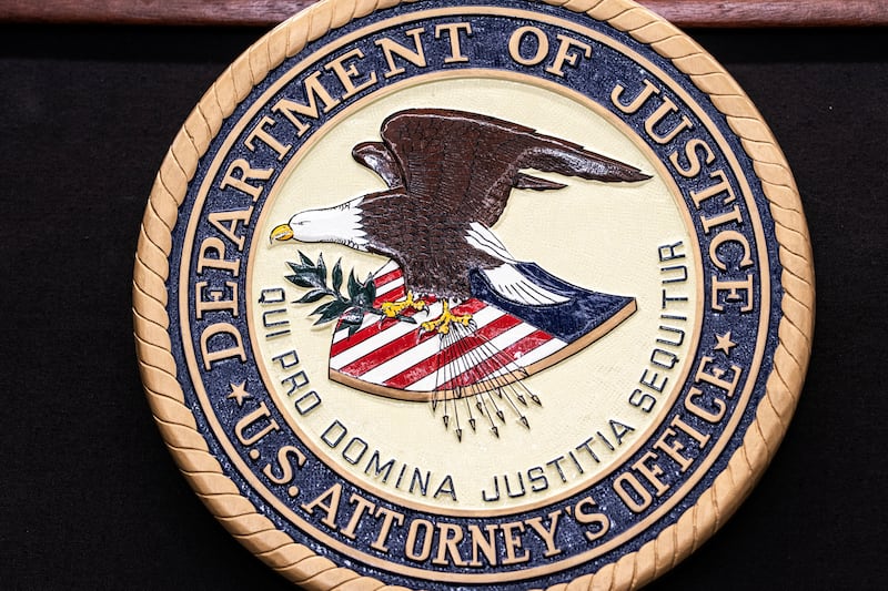 The seal of the U.S. Attorneys Office is seen during a press conference at the Justice Department in Washington, D.C., U.S., April 22, 2026.