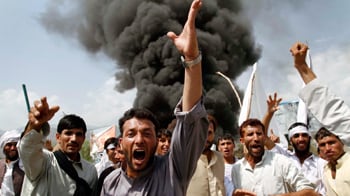 cheats/2011/04/03/koran-burning-protests-rage-for-third-day/afghan-koran-burning_bzwufn