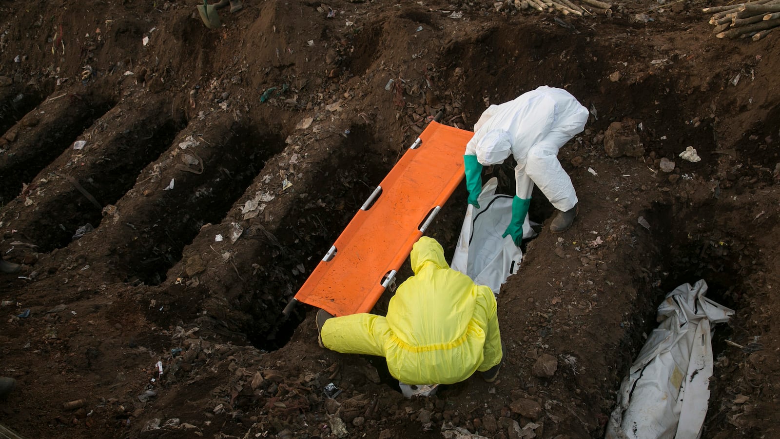 articles/2014/12/19/uh-oh-ebola-vaccine-trials-stop/141218-cowart-ebola-tease_h9fkpp