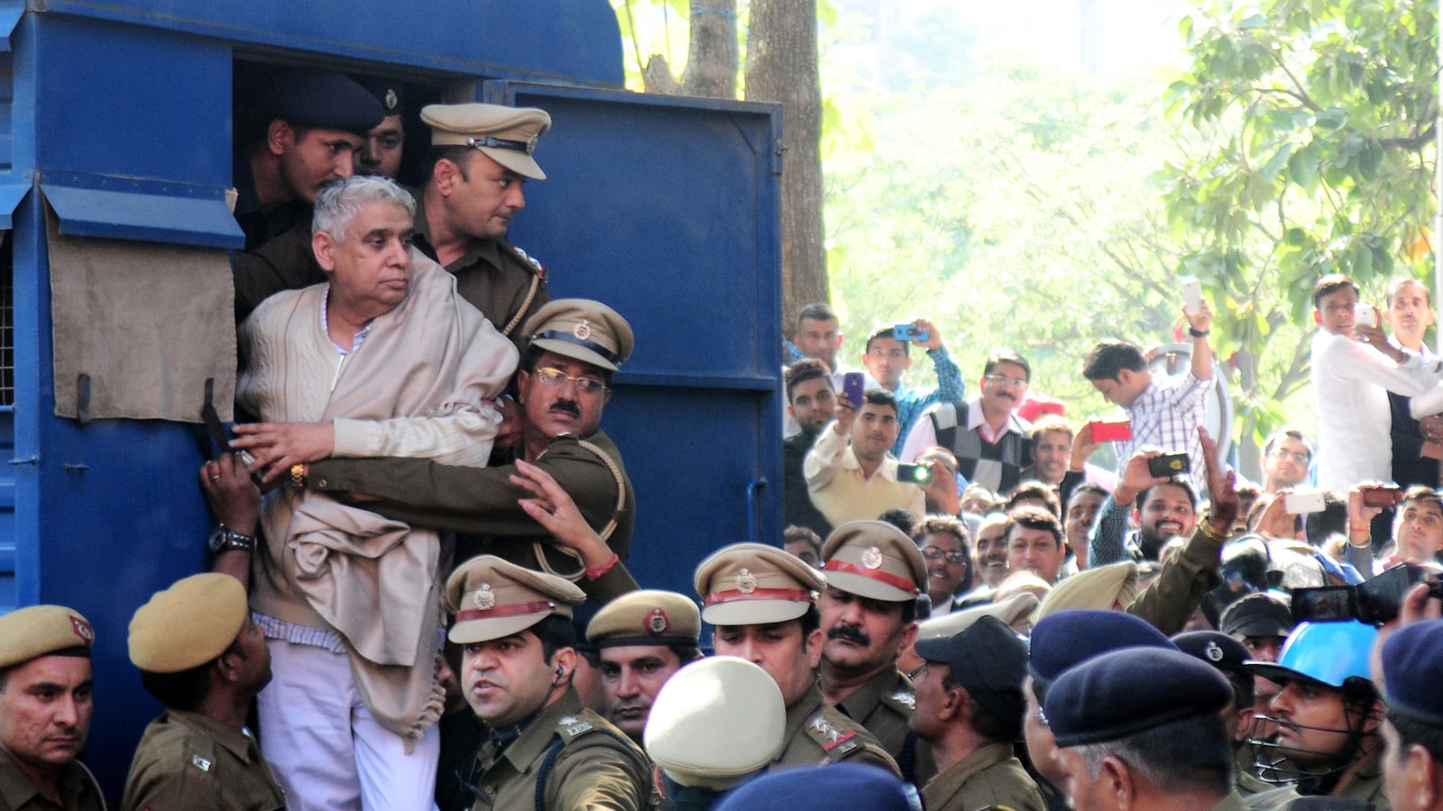 articles/2014/11/21/is-india-s-fallen-god-man-so-different-than-a-megachurch-pastor/141120-michaelson-rampal-tease_us0m3k