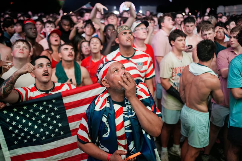 Soccer Football - FIFA World Cup 2026 - Round of 32 - United States v Bosnia and Herzegovina- Fans gather in Washington - Washington, D.C., U.S. - July 1, 2026 United States fans react as they watch the match on a big screen at the National Mall REUTERS/Cheney Orr
