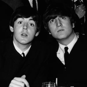 13th September 1964:  Beatles Paul McCartney (left) and John Lennon (1940 - 1980) at the Variety Club Showbusiness Awards held at the Dorchester, London.  (Photo by William Vanderson/Fox Photos/Getty Images)
