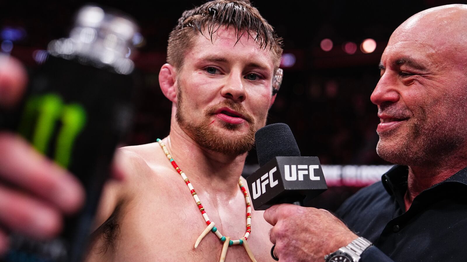 Bryce Mitchell (left) is interviewed by Joe Rogan after his win in a featherweight bout during the UFC 310 event on December 0, 2024 in Las Vegas, Nevada.