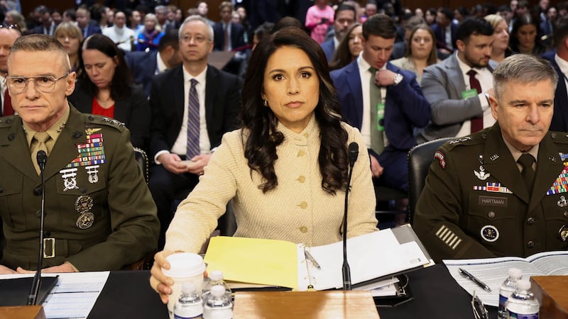 Defense Intelligence Agency Director Lt. Gen. James Adams, Director of National Intelligence (DNI) Tulsi Gabbard and Acting National Security Agency Director Lt. Gen. William Hartman testify before a Senate Intelligence Committee hearing on Capitol Hill in Washington, D.C., U.S., March 18, 2026.  REUTERS/Kevin Lamarque