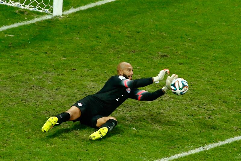 articles/2014/06/26/tim-howard-he-s-tattooed-he-s-got-tourette-s-and-he-s-america-s-only-world-cup-hope/140701-howard-soccer-tease_caxb6q