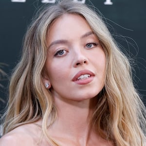 Sydney Sweeney (L) and Barron Trump (R)