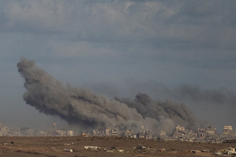SOUTHERN ISRAEL, ISRAEL - OCTOBER 5: Smoke rise over the Gaza Strip after an Israeli bombardment as seen from a position on the Israeli side of the border on October 5, 2025 in Southern Israel, Israel. Indirect talks between Israel, Hamas, and US mediators are set to begin in Cairo on Monday, following President Donald Trump's imposed ceasefire deadline set for today. Hamas has said in statement that it agrees to free the remaining hostages in Gaza under the US peace plan, but has not agreed to disarmament and other aspects outlined under the  20-point plan. A statement from Israeli Prime Minister Benjamin Netanyahu's office said, "Israel is preparing to immediately implement the first phase of Trump's plan for the immediate release of all hostages." (Photo by Amir Levy/Getty Images)