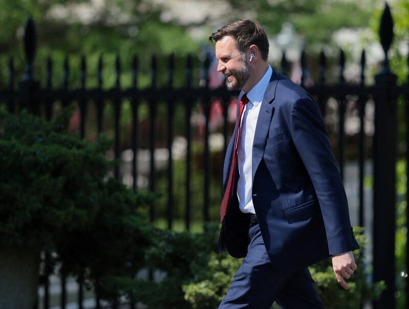 U.S. Vice President JD Vance arrives at the White House through the front door.