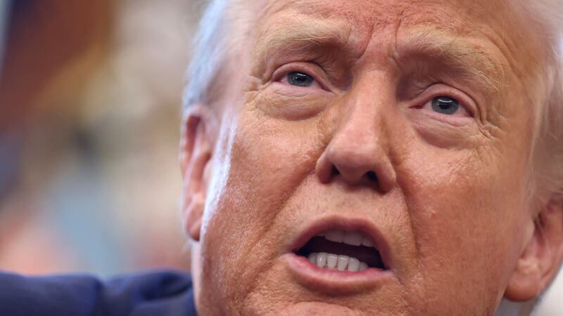 FILE PHOTO: U.S. President Donald Trump delivers remarks in the Oval Office at the White House in Washington, D.C., U.S., August 14, 2025.