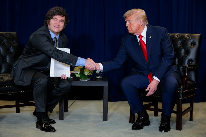 U.S. President Donald Trump (R) shakes hands with President of Argentina Javier Milei during a bilateral meeting at the UN’s General Assembly (UNGA) in September.