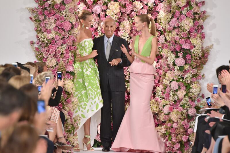 galleries/2014/10/21/oscar-de-la-renta-dead-at-82-his-life-in-photos/141020-oscar-1_tovgos