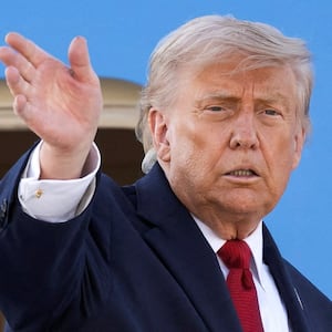 U.S. President Donald Trump gestures as he boards Air Force One at Geneva Airport following the G7 summit in nearby Evian (France), in Geneva, Switzerland, June 17, 2026. Martial Trezzini/Pool via REUTERS