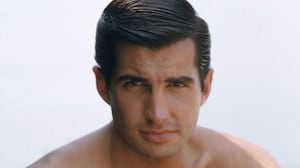 George Hamilton in a bare-chested portrait circa 1964.