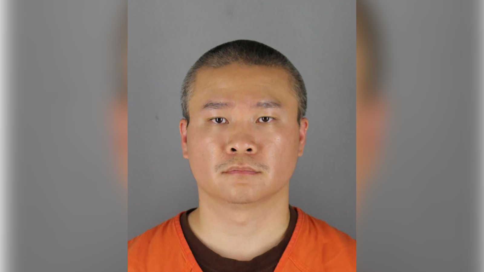 Tou Thao stares forward in a mugshot.