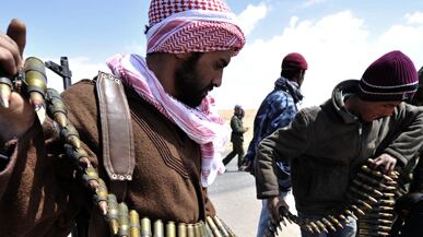 cheats/2011/03/26/libyan-rebels-recapture-key-town/nc-libyan-rebel-surge_xul0dv