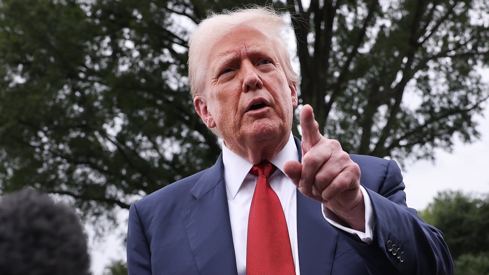 President Donald Trump speaks to the media as he departs the White House on August 01, 2025 in Washington, DC.