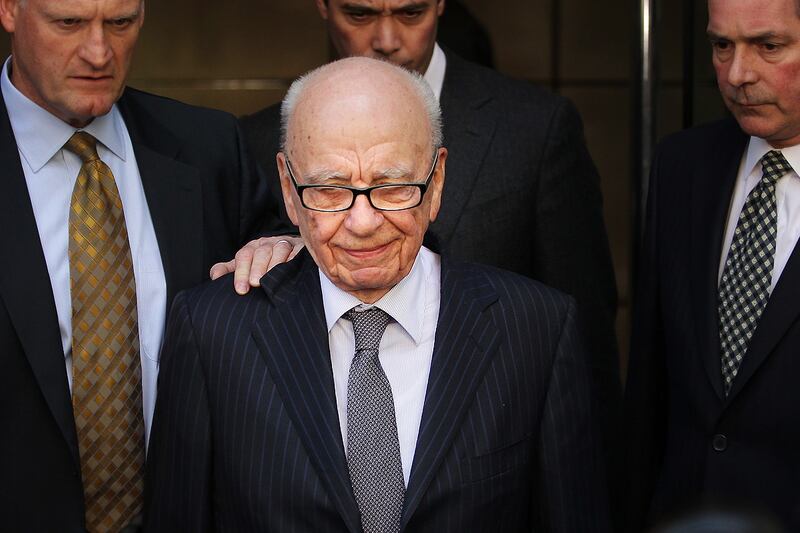 articles/2012/01/19/rupert-murdoch-pays-compensation-to-37-victims-of-phone-hacking/murdoch-court-cheat_vpwn53