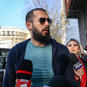 Andrew Tate at the Directorate for a hearing.