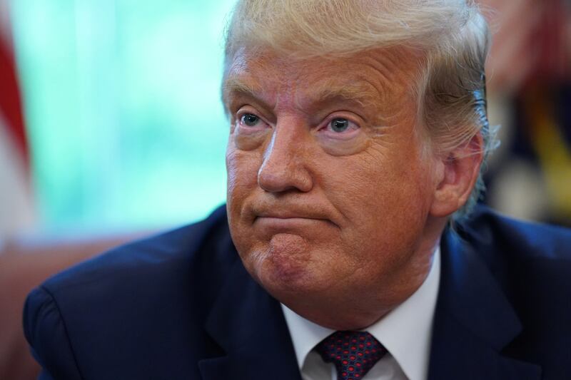 U.S. President Donald President Trump faces reporters after it was announced Bahrain has joined the United Arab Emirates in striking an agreement to normalize relations with Israel during a brief appearance in the Oval Office at the White House in Washington, U.S., September 11, 2020. REUTERS/Kevin Lamarque