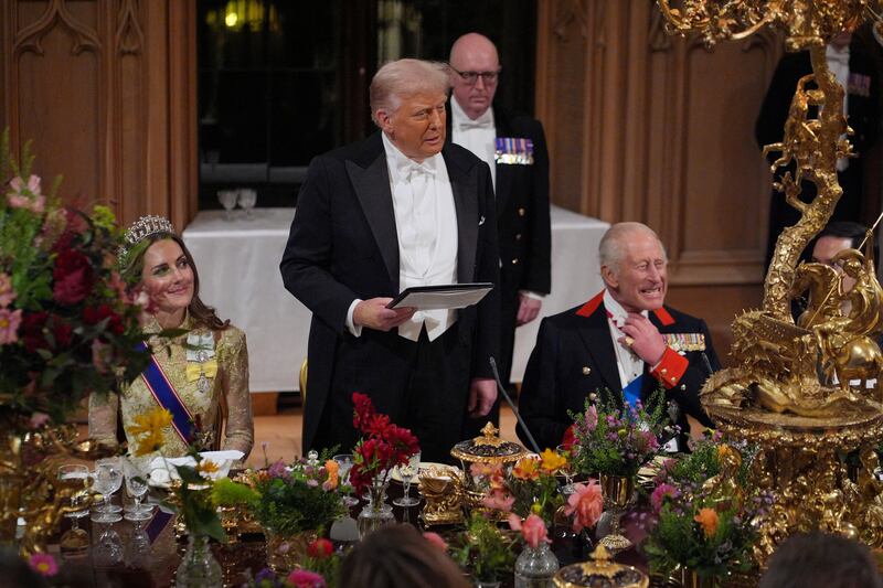 US President Donald Trump delivers his speech as King Charles III and the Princess of Wales listen
