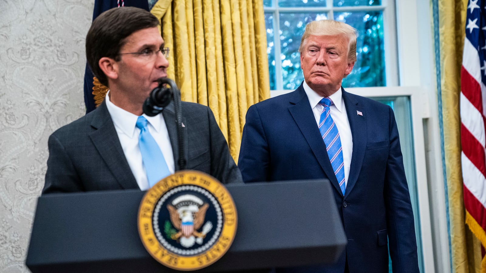 President Donald J. Trump watches as Mark Esper speaks after being sworn in as Secretary of Defense by Associate Justice of the Supreme Court Samuel Alito in the Oval Office at the White House on Tuesday, July 23, 2019 in Washington, DC.