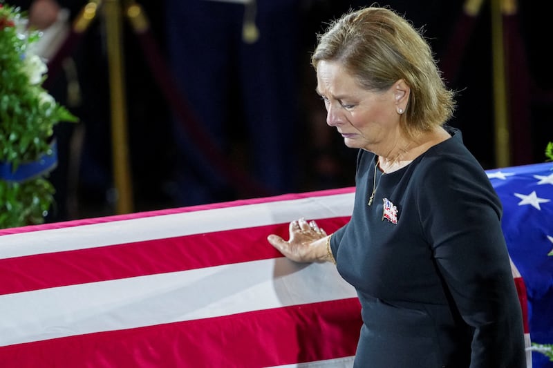 U.S. Senator Darline Graham (R-SC), sister of late U.S. Senator Lindsey Graham (R-SC), mours by his casket, during a Congressional Tribute to late U.S. Senator Lindsey Graham (R-SC) at the Rotunda of the U.S. Capitol in Washington, D.C., U.S., July 28, 2026. REUTERS/Nathan Howard/Pool