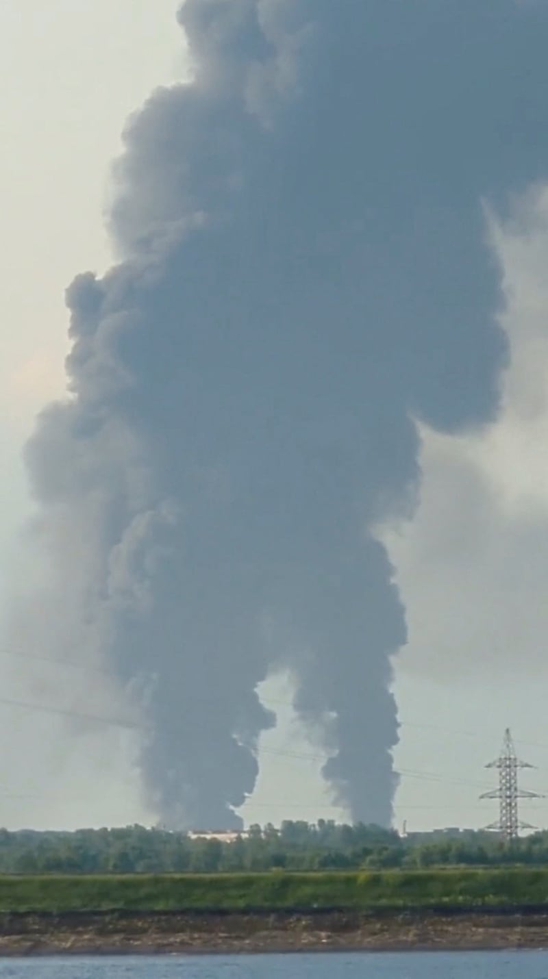 Black smoke rises from the city of Rybinsk, Yaroslavl Region, Russia June 14, 2026, in this screengrab obtained from a social media video, as Ukraine hit an oil facility overnight in Russia's Yaroslavl region, according to Ukrainian President Volodymyr Zelenskiy's post on X on Sunday.  SOCIAL MEDIA/via REUTERS  THIS IMAGE HAS BEEN SUPPLIED BY A THIRD PARTY. MANDATORY CREDIT. NO RESALES. NO ARCHIVES. NEWS USE ONLY.  VERIFICATION:  - Buildings, utilities towers and water body matched archive and satellite images - Coordinates of the construction seen in the video: 58.08230450845519, 38.82520239285728 - Ukrainian president, Volodymyr Zelenskiy wrote on X on June 14 that Ukrainian forces attacked an oil facility in Russia’s Yaroslavl region - Yaroslavl region governor, Mikhail Yevrayev, confirmed that fire broke out after drone attack on a fuel storage facility on June 14 - No older version found posted online before June 14